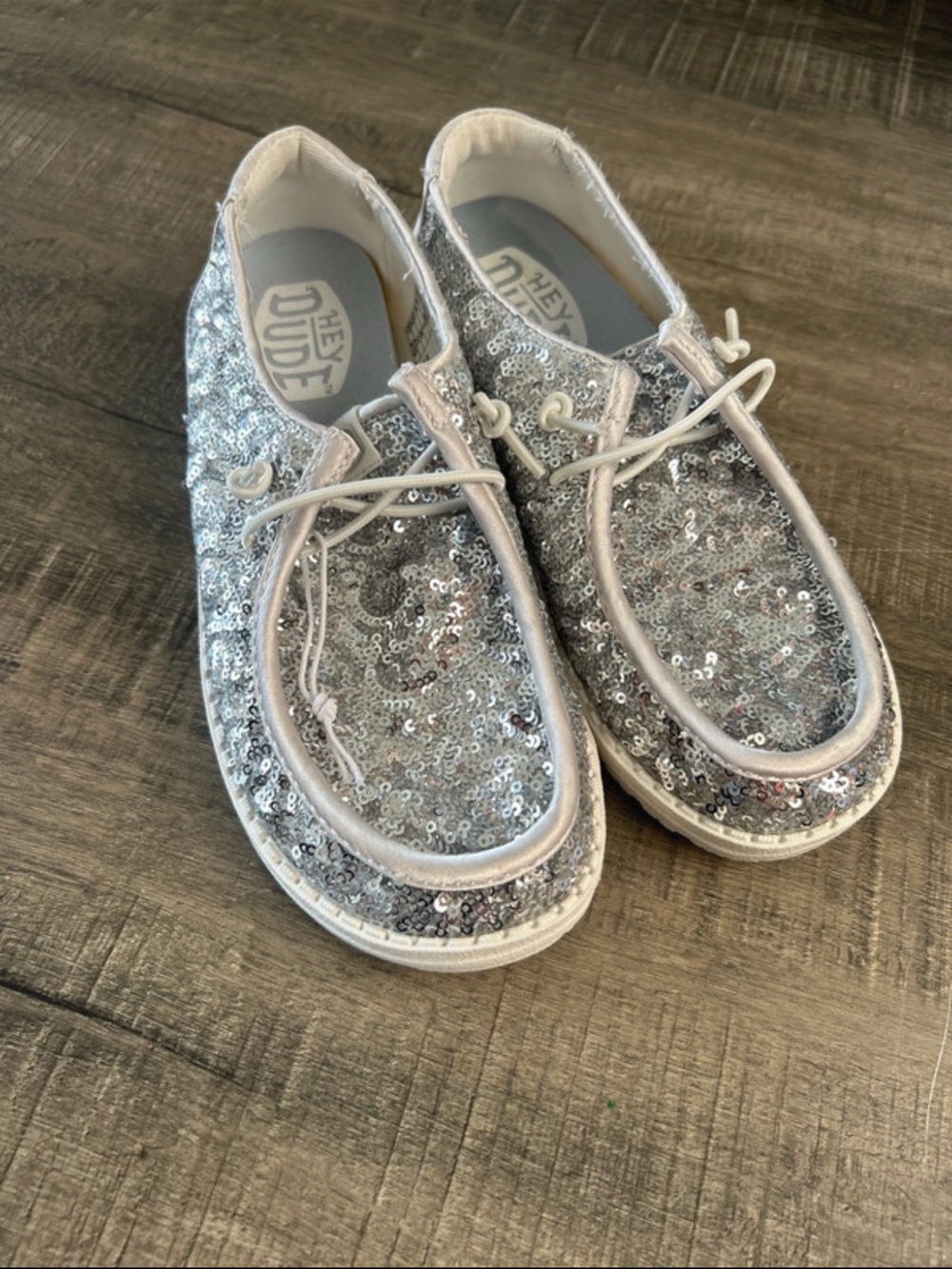 Hey Dude women’s  Silver Sequin Slip-Ons with Elastic Laces